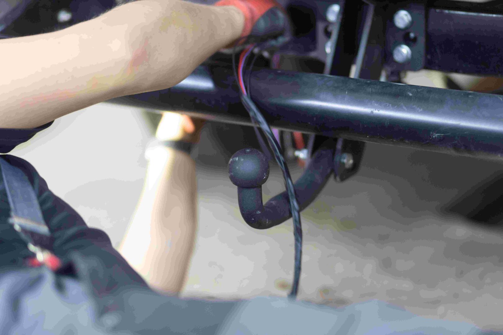 Trailer,coupling.installing,a,towbar,on,a,passenger,car.cargo,transportation,by