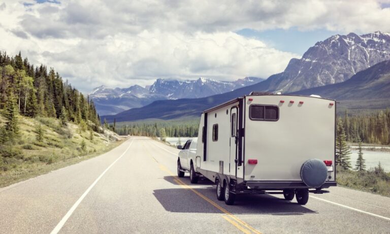 Caravan on raod country and mountain scene
