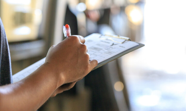 Man holding a clipboard